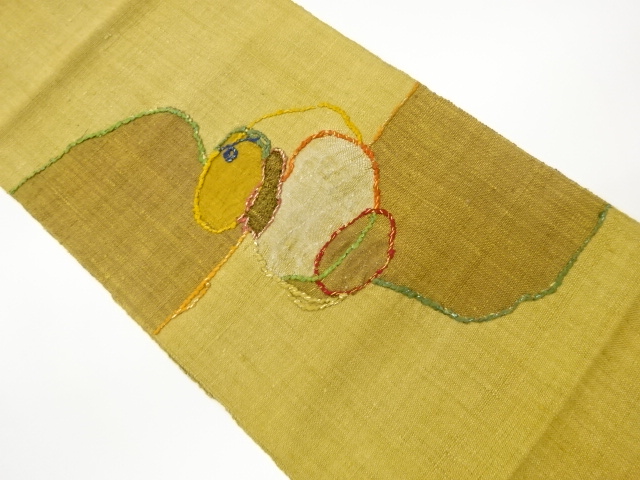 手織り紬紐通し抽象模様織出し名古屋帯